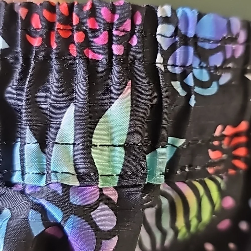 Shorts by Lost. Colorful size medium.  2‎ front pockets, 1 button pocket …